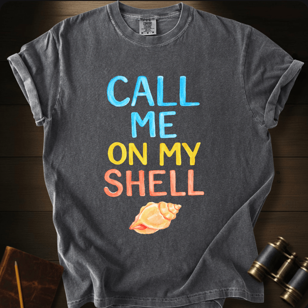 Full Sail Marine Call Me On My Shell colorful text graphic Comfort Colors t-shirt in Pepper – seashell conch beach funny saying ocean coastal design – front view
