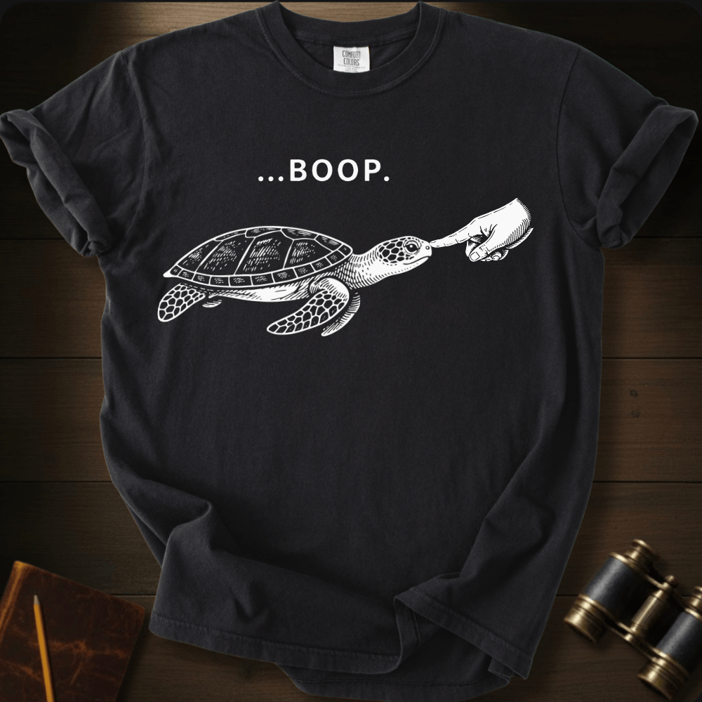 Full Sail Marine Turtle Boop sea turtle graphic Comfort Colors t-shirt in black – white sea turtle reaching flipper with BOOP text design – front view