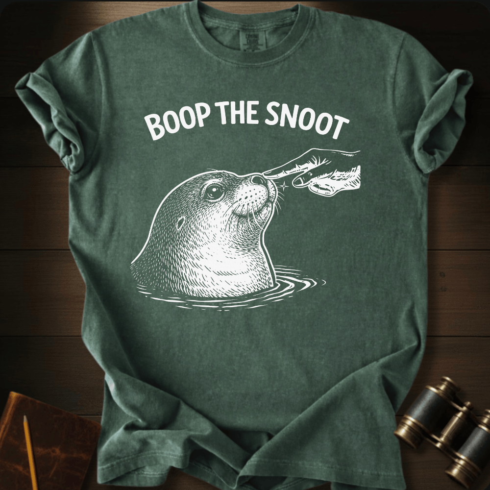 Full Sail Marine Boop the Snoot seal graphic Comfort Colors t-shirt in hemp green – white seal being booped on nose by hand with BOOP THE SNOOT text design – front view