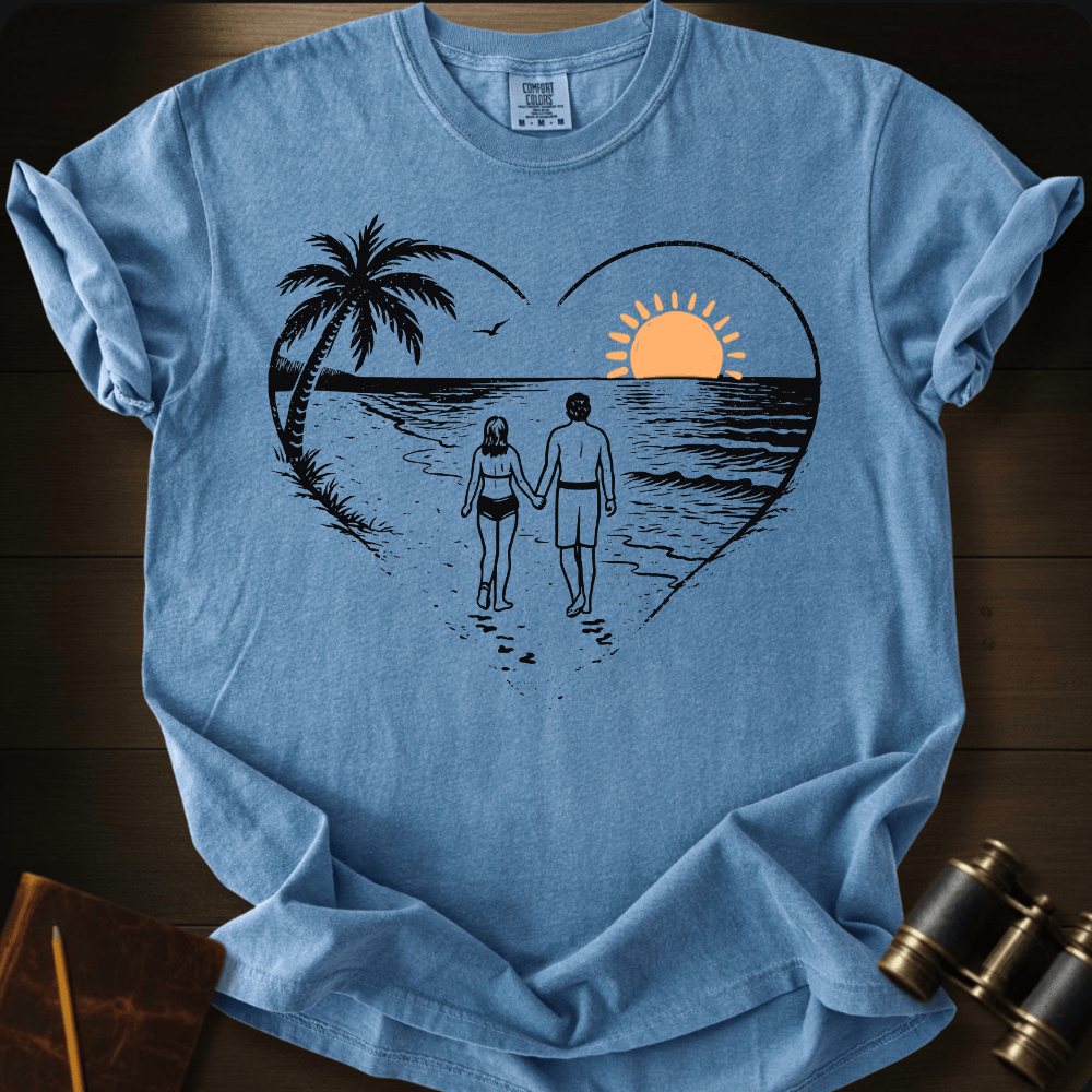 Full Sail Marine Sunset Walk beach couple heart graphic Comfort Colors t-shirt in blue jean – romantic sunset palm tree ocean scene – front view