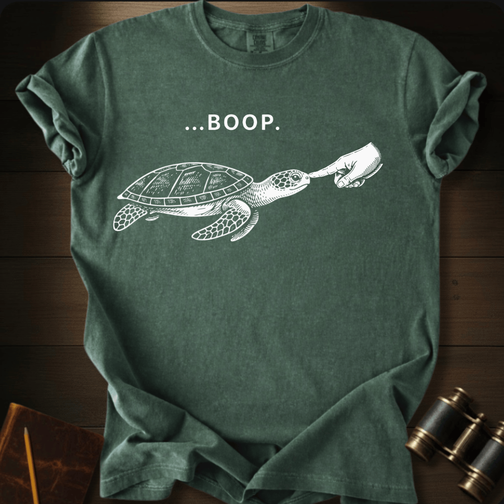 Full Sail Marine Turtle Boop sea turtle graphic Comfort Colors t-shirt in hemp green – white sea turtle reaching flipper with BOOP text design – front view