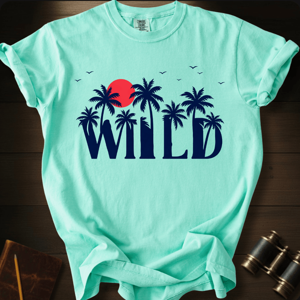 Full Sail Marine Wild palm trees and sunset graphic Comfort Colors t-shirt in island reef – tropical WILD text with red sun and birds design – front view