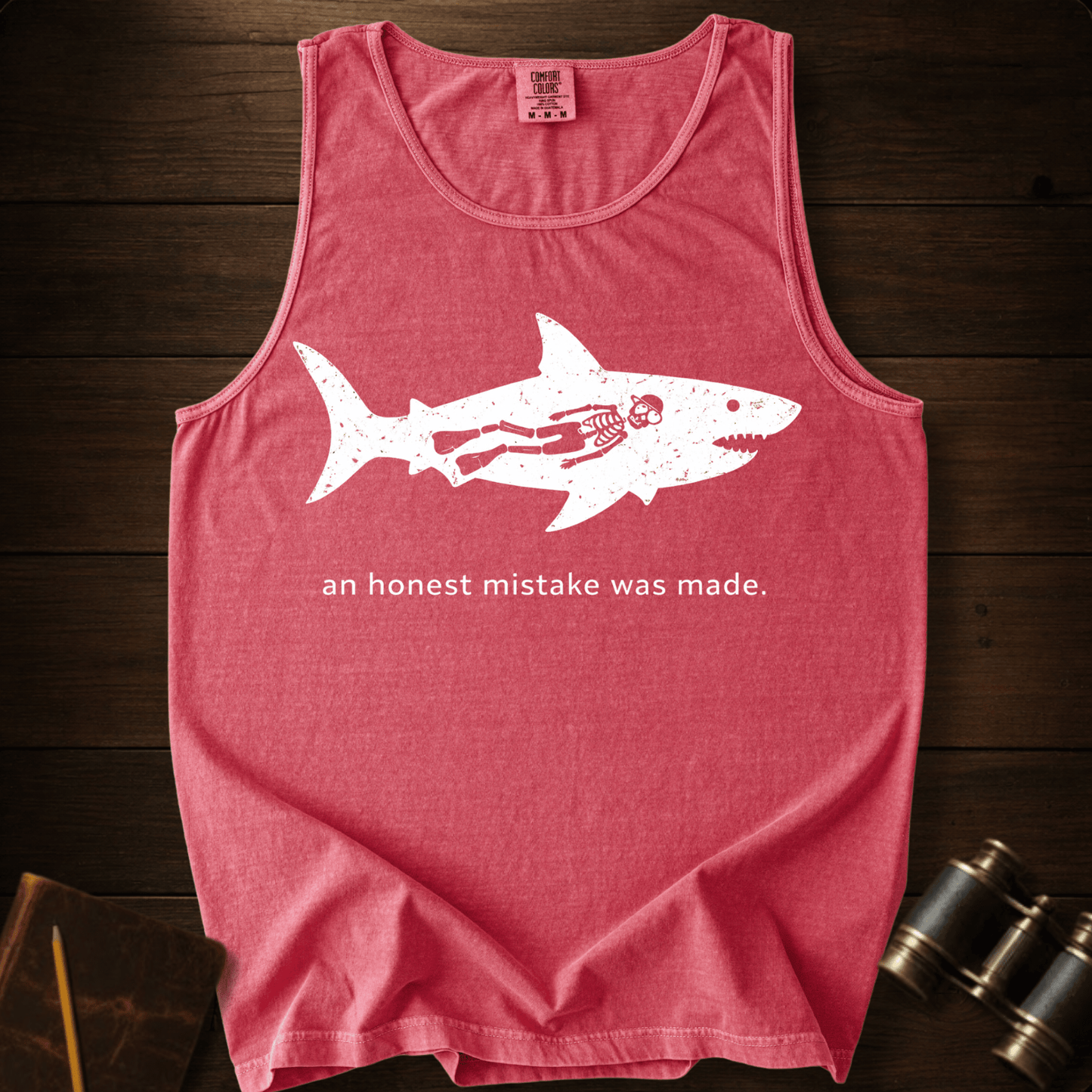 Full Sail Marine An Honest Mistake shark skeleton graphic Comfort Colors tank top in Watermelon – funny ocean art quote design – front view