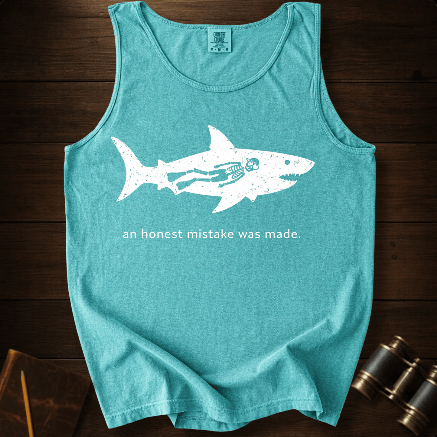 Full Sail Marine An Honest Mistake shark skeleton graphic Comfort Colors tank top in Chalky Mint – funny ocean art quote design – front view