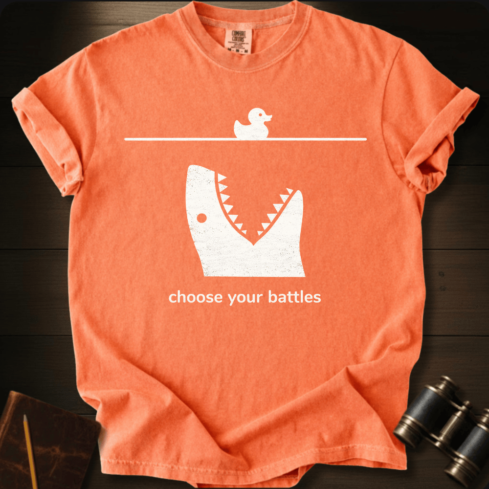 Full Sail Marine Choose Your Battles rubber duck and shark jaw funny graphic Comfort Colors t-shirt in bright salmon – humorous ocean predator design – front view