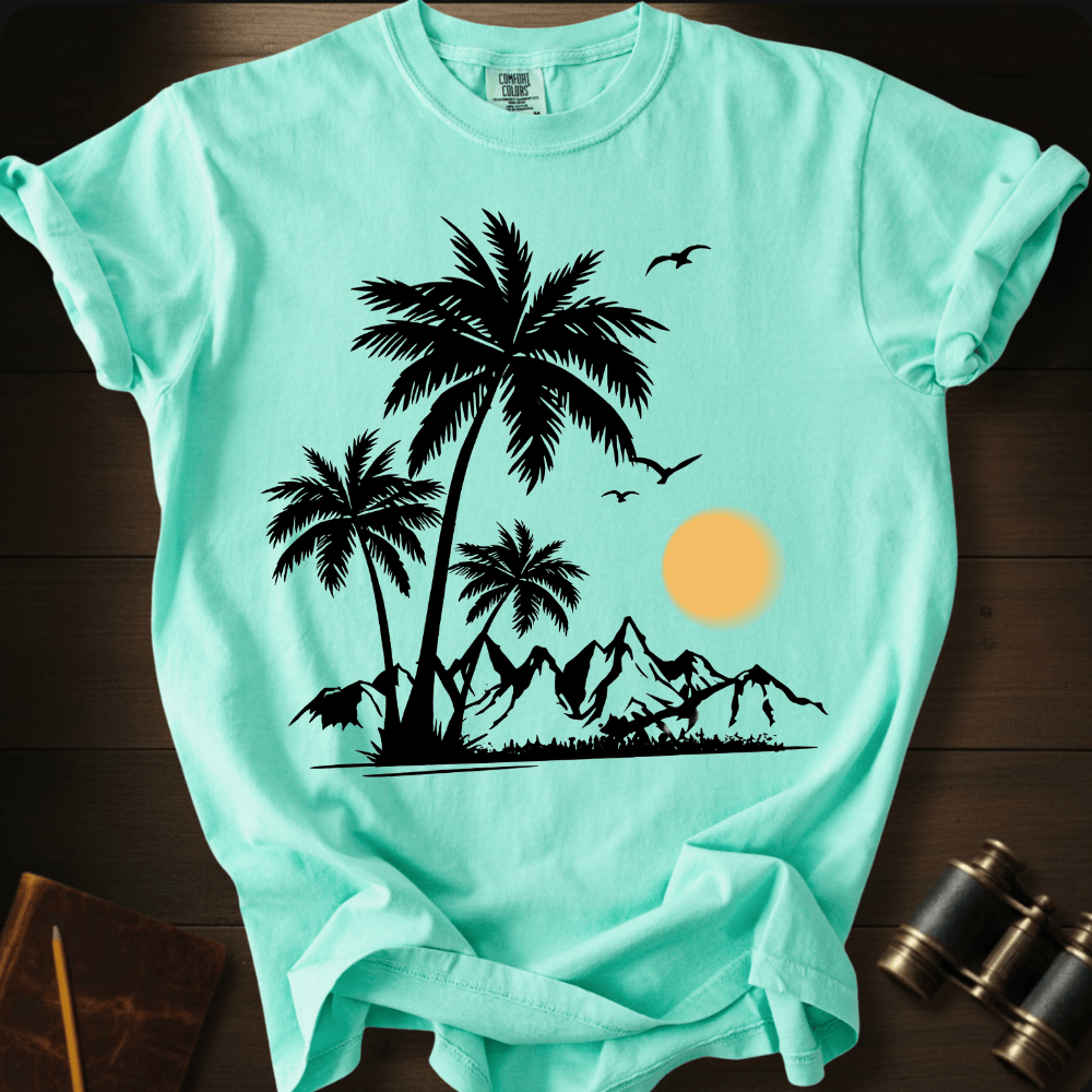 Full Sail Marine Sunfall Palms tropical palm trees and mountains silhouette graphic Comfort Colors t-shirt in island reef – beach sunset scene with birds design – front view