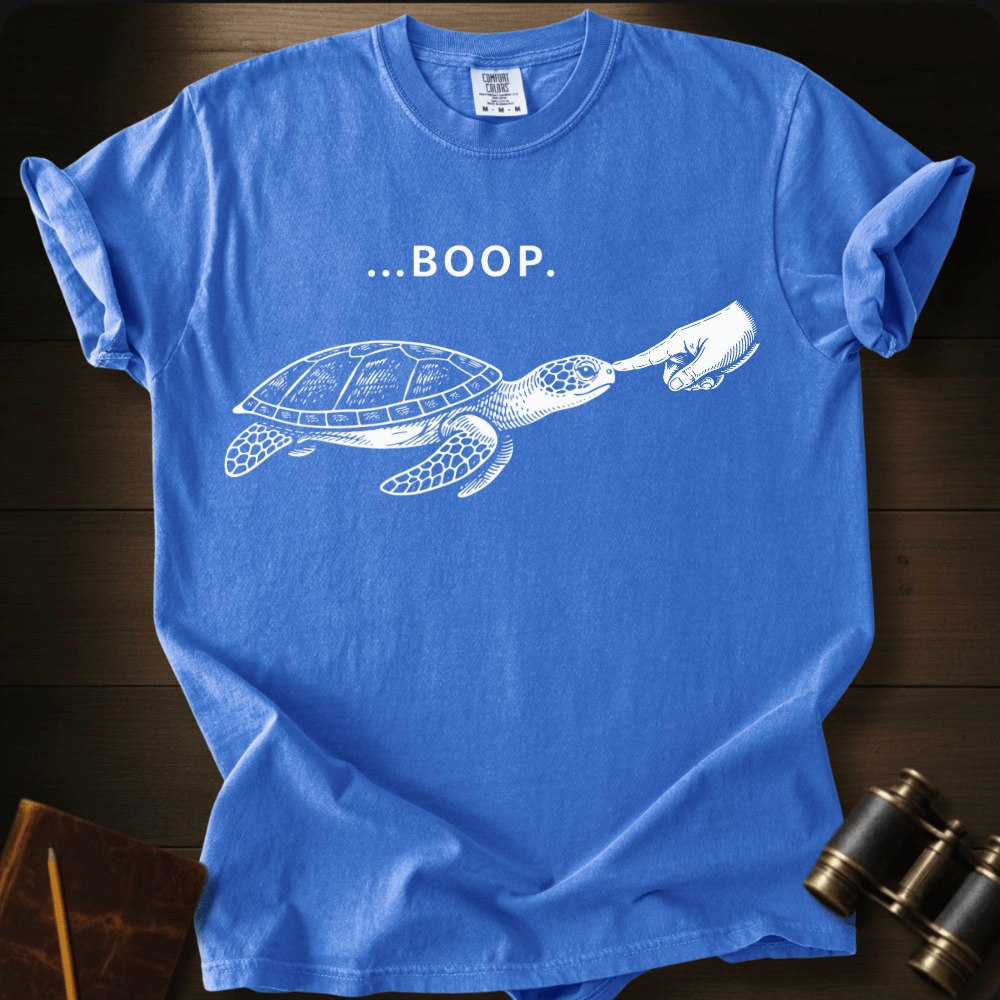 Full Sail Marine Turtle Boop sea turtle graphic Comfort Colors t-shirt in flo blue – white sea turtle reaching flipper with BOOP text design – front view