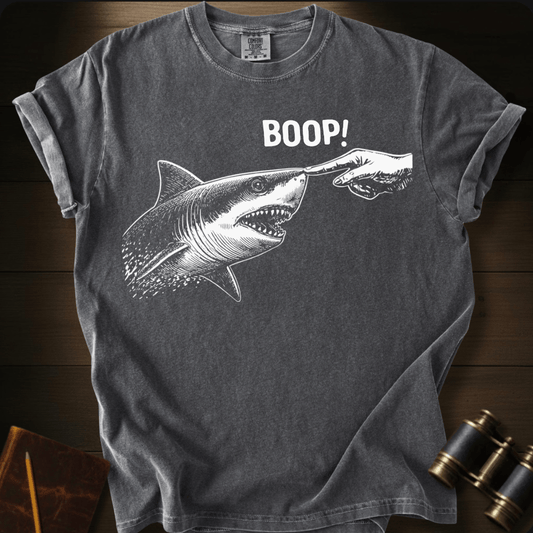 Full Sail Marine Boop! shark booping dolphin nose funny graphic Comfort Colors t-shirt in pepper – ocean wildlife humor design – front view