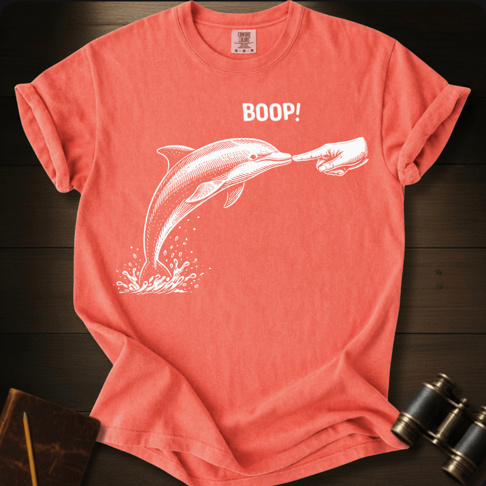 Full Sail Marine Boop! dolphin graphic Comfort Colors t-shirt in bright salmon – white dolphin being booped on nose with hand and BOOP text design – front view