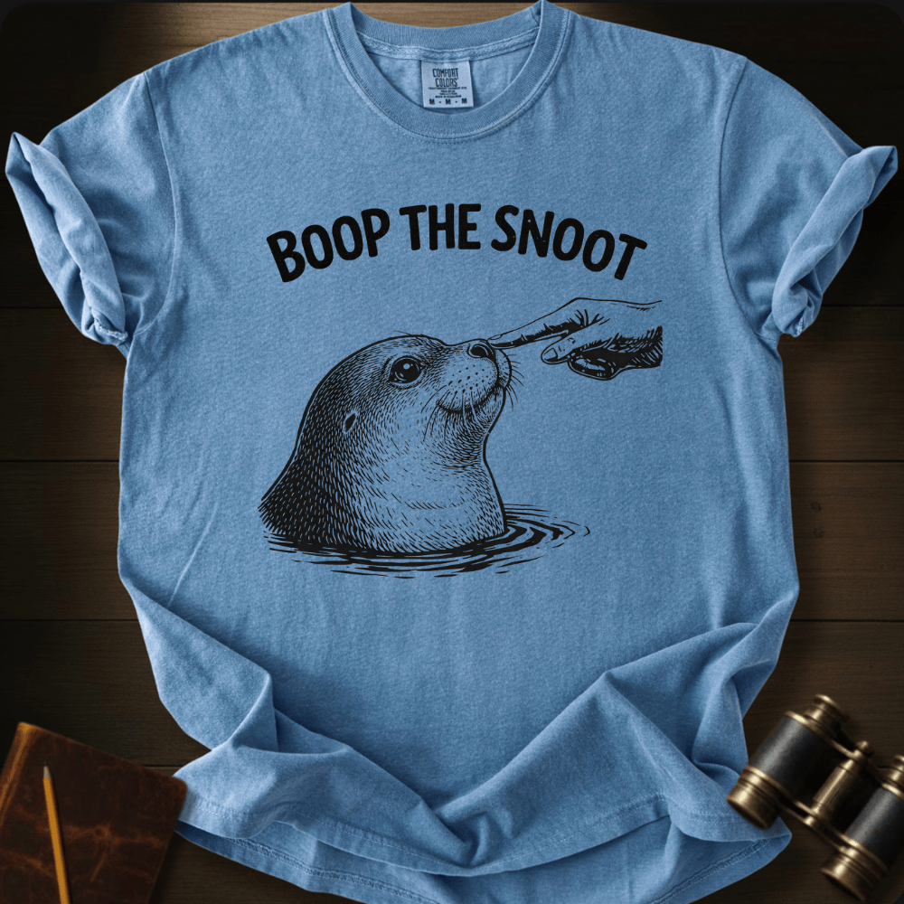 Full Sail Marine Boop the Snoot seal graphic Comfort Colors t-shirt in washed denim blue – navy seal being booped on nose by hand with BOOP THE SNOOT text design – front view