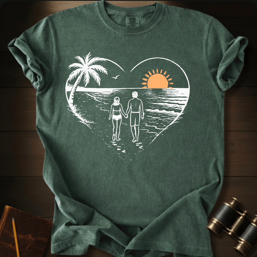 Full Sail Marine Sunset Walk beach couple heart graphic Comfort Colors t-shirt in hemp green – romantic sunset palm tree ocean scene – front view