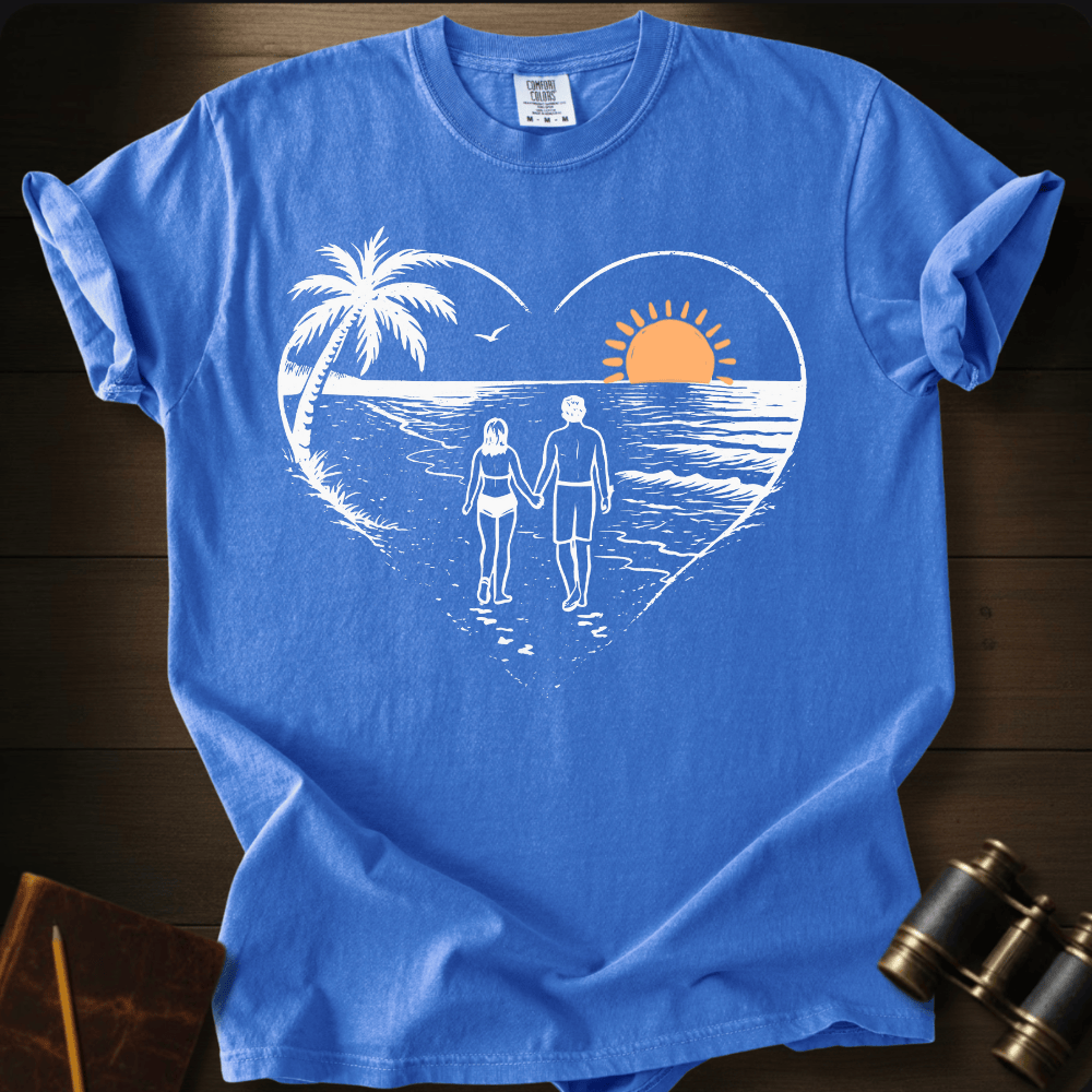 Full Sail Marine Sunset Walk beach couple heart graphic Comfort Colors t-shirt in flo blue – romantic sunset palm tree ocean scene – front view