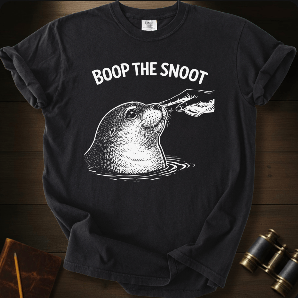 Full Sail Marine Boop the Snoot seal graphic Comfort Colors t-shirt in black – white seal being booped on nose by hand with BOOP THE SNOOT text design – front view