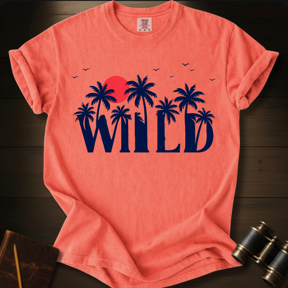Full Sail Marine Wild palm trees and sunset graphic Comfort Colors t-shirt in bright salmon – tropical WILD text with red sun and birds design – front view